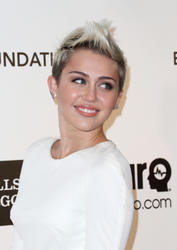 th_773241702_miley_cyrus_at_the_21st_annual_elton_john_aids_foundation_viewing_party_13_122_537lo.jpg
