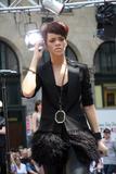 Rihanna performs live wearing black leather trousers on the CBS Early Show in New York City