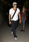 http://img237.imagevenue.com/loc556/th_86419_Kellan_Lutz_arrives_at_LAX10_122_556lo.jpg